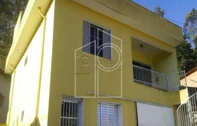 Imagem: A casa possui 2 Dormitórios, 2 Banheiros, 4 Vagas na garagem