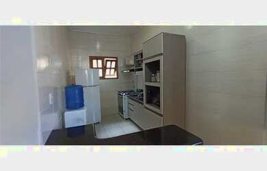 Imagem: A casa possui 2 Dormitórios, 1 Banheiro, 1 Vaga na garagem