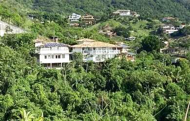 Imagem: A casa em condomínio possui 4 Dormitórios, 4 Banheiros, 5