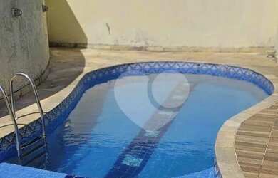 Imagem: A casa em condomínio possui 5 Dormitórios, 5 Banheiros, 5