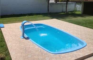 Imagem: A casa possui 4 Dormitórios, 4 Vagas na garagem e está localizado