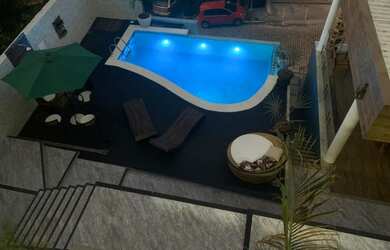 Imagem 3: Casa de condomínio para venda possui 377 metros quadrados com 4 quartos