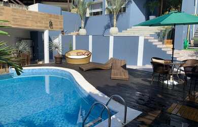 Imagem: A casa em condomínio possui 4 Dormitórios, 5 Banheiros, 2