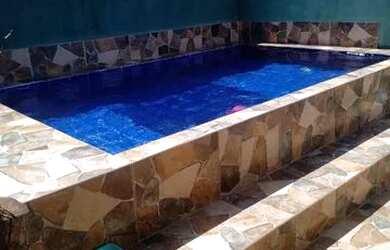 Imagem: A casa possui 2 Dormitórios, 1 Banheiro, 1 Vaga na garagem