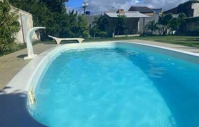 Imagem: A casa possui 4 Dormitórios, 5 Vagas na garagem e está localizado