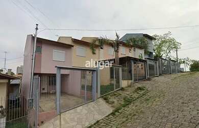 Imagem: A casa possui 2 Dormitórios, 1 Banheiro, 1 Vaga na garagem