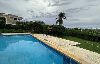 Imagem: A casa possui 5 Dormitórios, 5 Banheiros, 5 Vagas na garagem