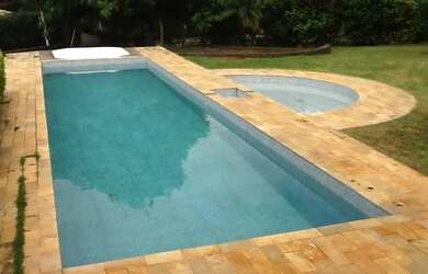 Imagem: A casa possui 3 Dormitórios, 5 Banheiros, 5 Vagas na garagem