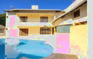 Imagem: A casa em condomínio possui 4 Dormitórios, 5 Banheiros, 5