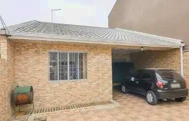 Imagem: A casa possui 3 Dormitórios, 2 Banheiros, 2 Vagas na garagem