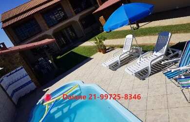 Imagem: A casa possui 4 Dormitórios e 4 Vagas na garagem e está localizado