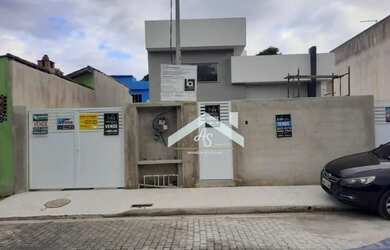 Imagem: A casa possui 3 Dormitórios, 2 Banheiros, 3 Vagas na garagem