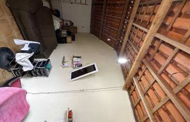 Imagem: A casa possui 3 Dormitórios, 1 Banheiro, 4 Vagas na garagem