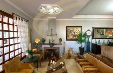 Imagem: A casa possui 3 Dormitórios, 4 Banheiros, 3 Vagas na garagem