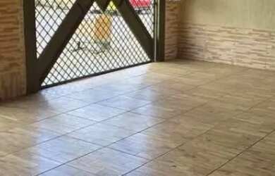 Imagem: A casa possui 2 Dormitórios, 1 Banheiro, 1 Vaga na garagem