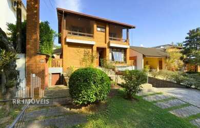 Imagem: A casa em condomínio possui 4 Dormitórios, 4 Banheiros, 4