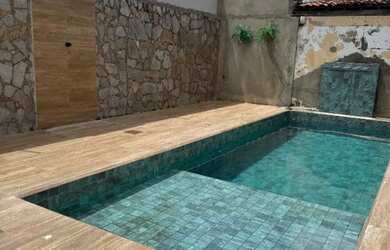 Imagem: A casa possui 5 Dormitórios, 5 Banheiros, 3 Vagas na garagem