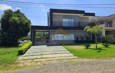 Imagem: A casa em condomínio possui 5 Dormitórios, 4 Banheiros, 5