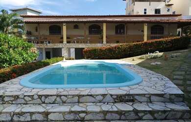 Imagem: A casa possui 4 Dormitórios, 5 Banheiros, 4 Vagas na garagem