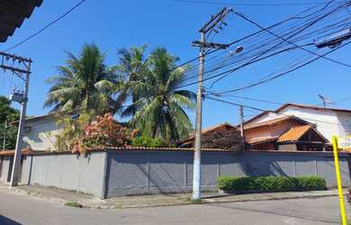 Imagem: A casa possui 3 Dormitórios, 3 Banheiros, 3 Vagas na garagem