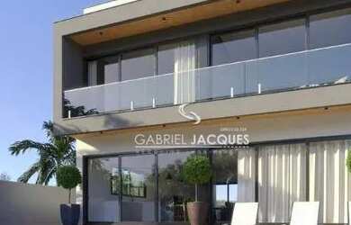 Imagem: A casa possui 3 Dormitórios, 4 Banheiros, 3 Vagas na garagem