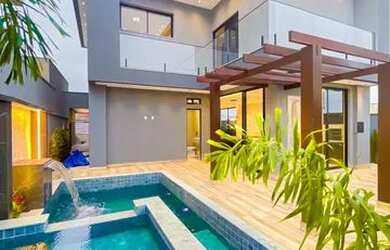 Imagem: A casa em condomínio possui 4 Dormitórios, 5 Banheiros, 4