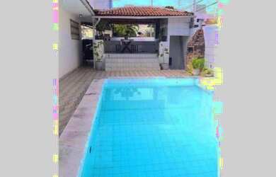 Imagem: A casa possui 3 Dormitórios, 4 Banheiros, 3 Vagas na garagem