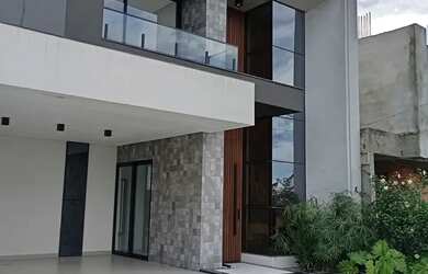 Imagem: A casa em condomínio possui 4 Dormitórios, 5 Banheiros, 4