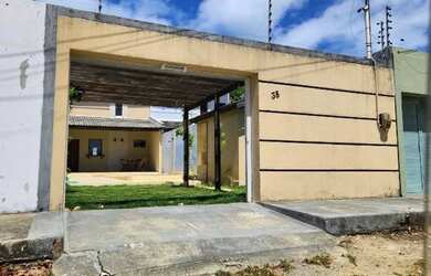 Imagem: A casa possui 2 Dormitórios, Acomodam 15 pessoas, 3 Vagas na