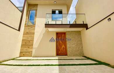 Imagem: A casa possui 2 Dormitórios, 2 Banheiros, 2 Vagas na garagem