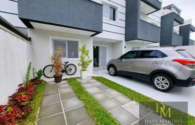 Imagem: A casa possui 2 Dormitórios, 4 Banheiros, 2 Vagas na garagem