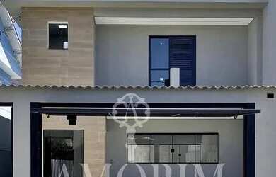 Imagem: A casa possui 3 Dormitórios, 3 Banheiros, 3 Vagas na garagem