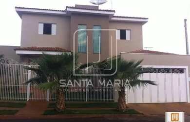 Imagem: A casa possui 3 Dormitórios, 3 Banheiros, 4 Vagas na garagem