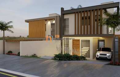 Imagem: A casa possui 3 Dormitórios, 3 Banheiros, 2 Vagas na garagem