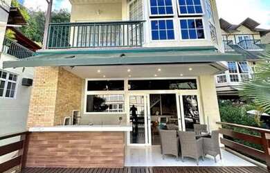 Imagem: A casa em condomínio possui 4 Dormitórios, 3 Banheiros, 2