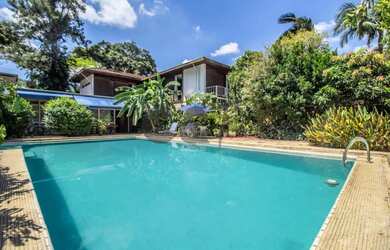 Imagem: A casa possui 4 Dormitórios, 4 Banheiros, 2 Vagas na garagem