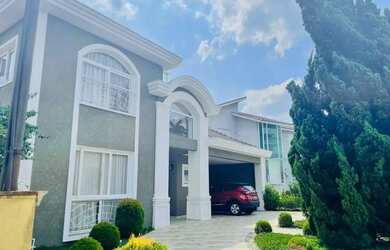 Imagem: A casa em condomínio possui 4 Dormitórios, 5 Banheiros, 4