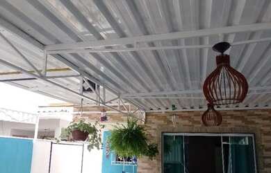 Imagem: A casa à venda possui 2 Dormitórios, 2 Banheiros e 1 Vaga