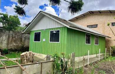 Imagem: A casa possui 2 Dormitórios, 1 Banheiro, 1 Vaga na garagem