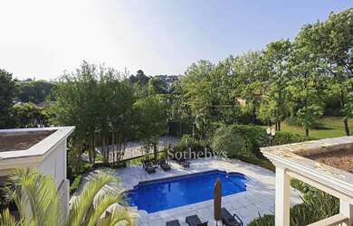 Imagem 3: Casa Clássica em Ponto Alto com Vista Deslumbrante