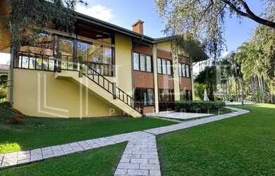 Imagem: A casa em condomínio para alugar possui 5 Dormitórios, 5 Banheiros