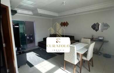 Imagem: A casa possui 3 Dormitórios, 3 Banheiros, 2 Vagas na garagem