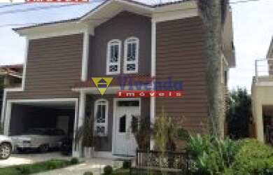 Imagem: A casa em condomínio possui 5 Dormitórios, 4 Banheiros, 2