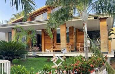 Imagem: A casa possui 4 Dormitórios, 1 Banheiro, 5 Vagas na garagem