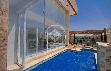 Imagem: A casa em condomínio possui 5 Dormitórios, 5 Banheiros, 4