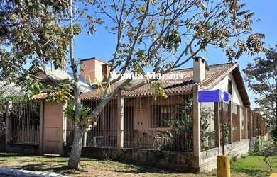 Imagem: A casa em condomínio possui 4 Dormitórios, 4 Banheiros, 2