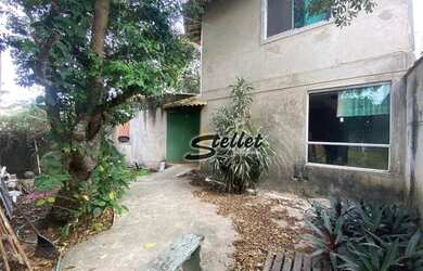 Imagem: A casa possui 1 Dormitório, 2 Banheiros, 3 Vagas na garagem