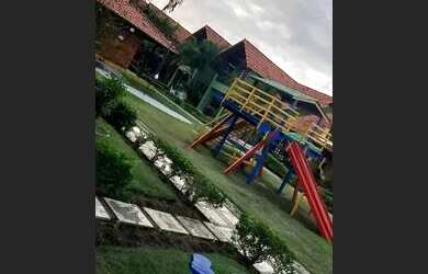 Imagem: A casa possui 4 Dormitórios, 2 Vagas na garagem e está localizado