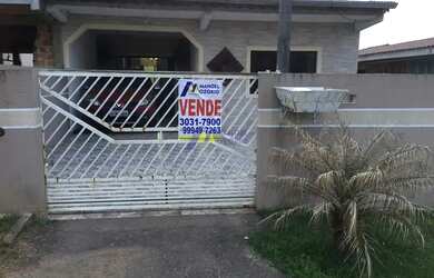 Imagem: A casa possui 3 Dormitórios, 1 Banheiro, 2 Vagas na garagem