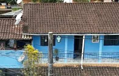 Imagem: A casa à venda possui 4 Dormitórios, 3 Banheiros, 1 Vaga na
